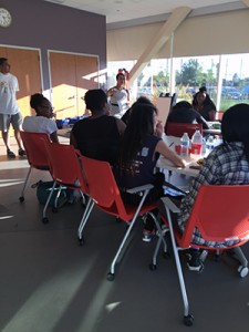 Hilary Bass making presentation to Rite of Passage participants